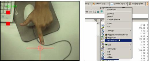 Aplicações 86 Figura 38 - Gesto INDICE_2 sendo utilizado para movimentar o ponteiro do mouse. Utilizando o gesto INDICE_2 podem-se selecionar itens do menu.