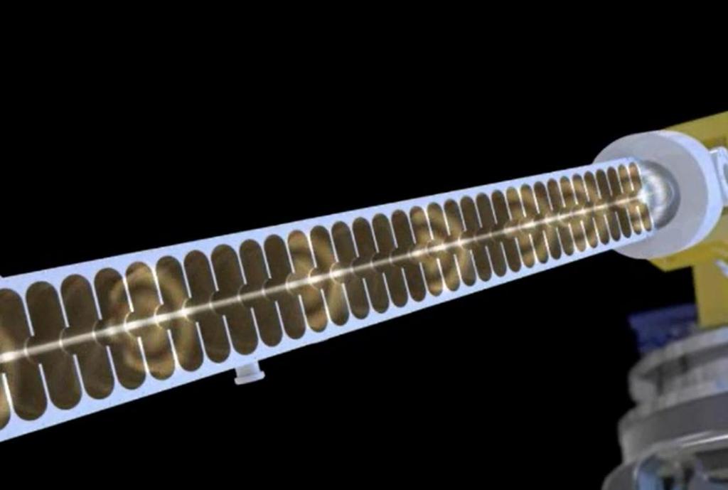 Acelerador linear digital Geração do feixe O guia de ondas contém uma sequência de células de cobre Pequenas aberturas circulares entre as células permitem que os
