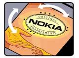 quase em contacto e, observando-o de outro ângulo, o logótipo Nokia Original Enhancements. 2.