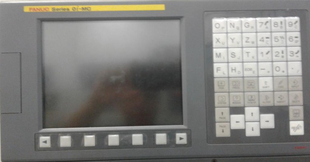 Painel Centro de Usinagem CNC Tela do Visor LCD Painel de: Edição de programa Execução de programa Controle manual dos eixos Painel
