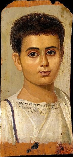 Retrato do menino Eutyches. Egito, 100-150 a.c. Encáustica sobre madeira, 38 x 19 cm.