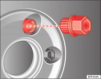 158 Substituição de uma roda: desapertar os parafusos das rodas Inserir o gancho metálico através da abertura no centro do protector fig. 157.