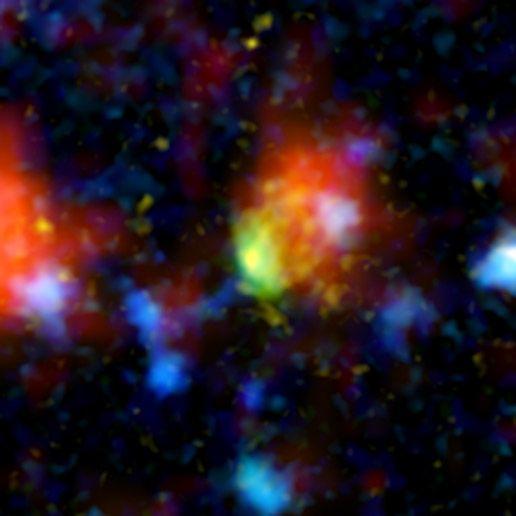 Galáxias Starbust A mancha verde e vermelha nesta imagem é a galáxia mais ativa no universo distante. Apelidada de "Baby Boom", a galáxia produz uma média de até 4.