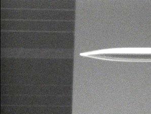 (lensed-tip fiber optics) com uma ponta de 2 m (LaserOptics), mostrada na Figura 3.