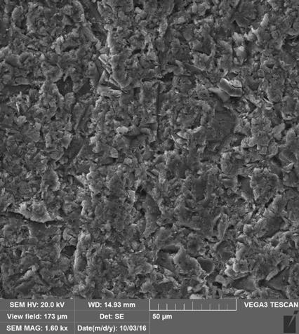 Essa remoção de material pode ser visualizada de forma mais evidente nas regiões apontadas pelas setas na Figura 11, e destacada na Figura 12,