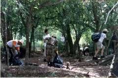 2003 ŸAção comunitária para limpeza dos córregos Restinga, Bonito e Marambaia, convocando a população para mudança de atitude