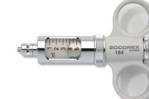 válvula Bocal Luer Lock A embalagem inclui seringa, manga de proteção em PVC e instruções de funcionamento.