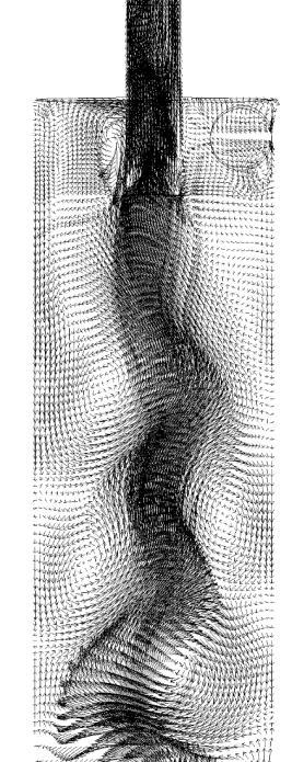 (a) (b) Figura 5.37: Campo vetorial da parte cilíndrica do escoamento do fluido no plano XY para (a) HciF(K1- ε1) e (b) Hcon para vazão volumétrica de alimentação 295,7cm³/s.