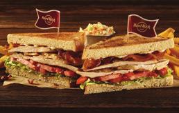 CLASSIC CLUB SANDWICH* Pão de forma tostado, recheado com maionese, alface americana, tomate, bacon e finas fatias de frango grelhado.