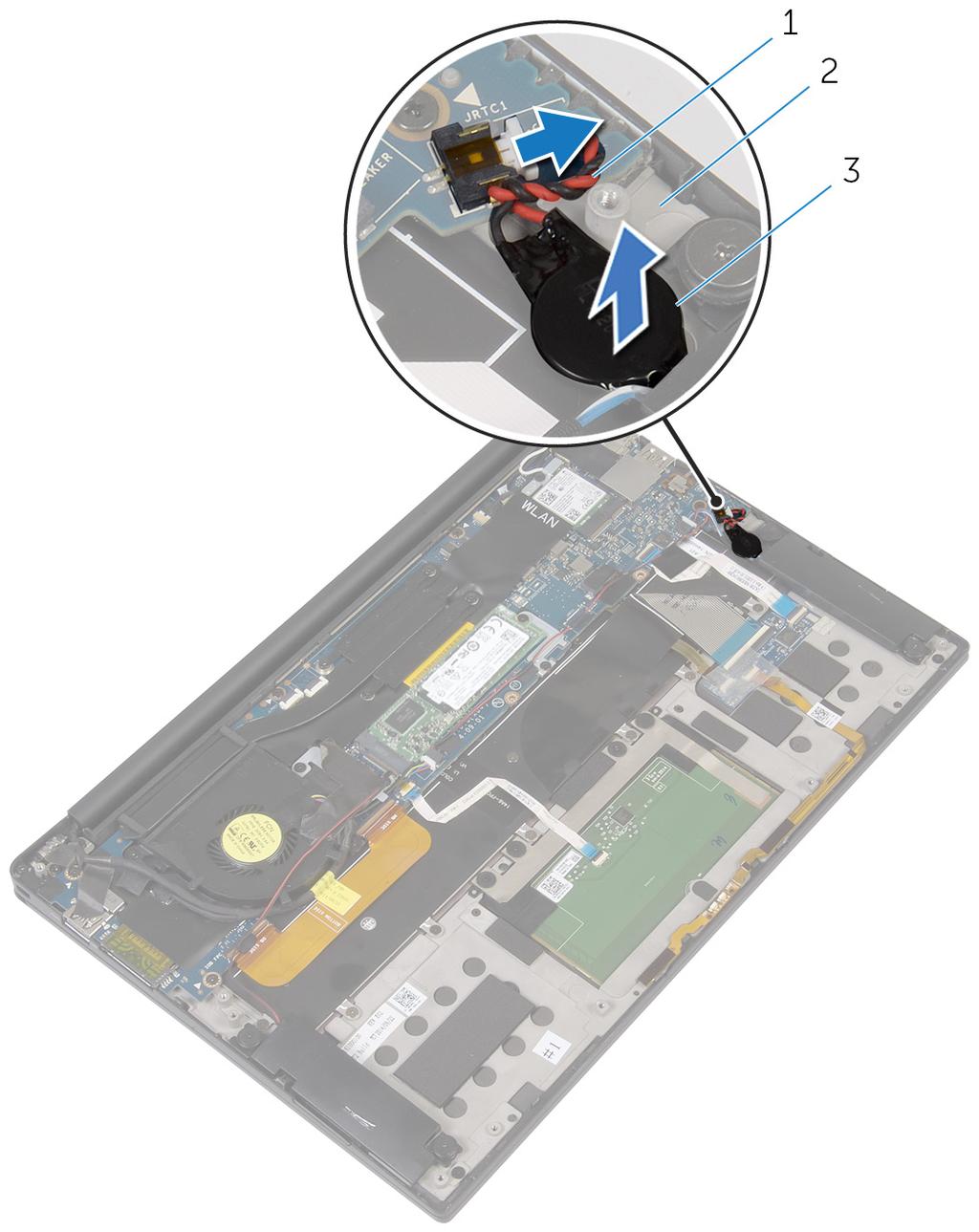 2 Observe a localização da bateria célula tipo moeda e retire-a do conjunto do apoio para as mãos. Figura10.