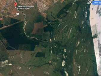 Figura 9. Foto aérea da empresa de saneamento básico abrangendo o Córrego da Onça e Rio Paraná. Córrego da Onça Fonte: Google Maps (maio, 2017).
