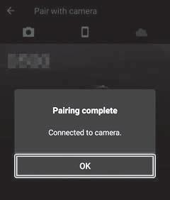 6 Conclua o pareamento. Câmera: pressione o botão k. Dispositivo inteligente: toque em OK.