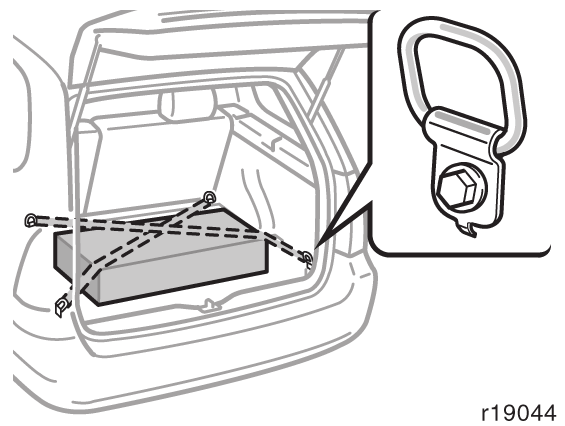 Para fixar a bagagem, use os ganchos ilustrados acima.