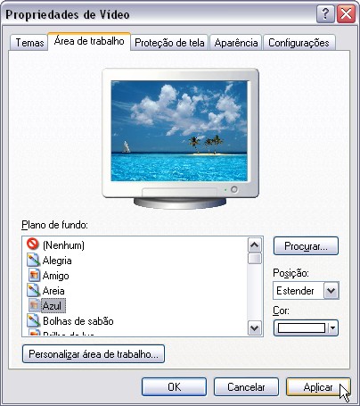 ABA ÁREA DE TRABALHO Na aba área de trabalho, podemos modificar a imagem que será colocada no fundo do desktop do Windows XP (papel de parede) existe uma galeria de imagens que podemos escolher, caso