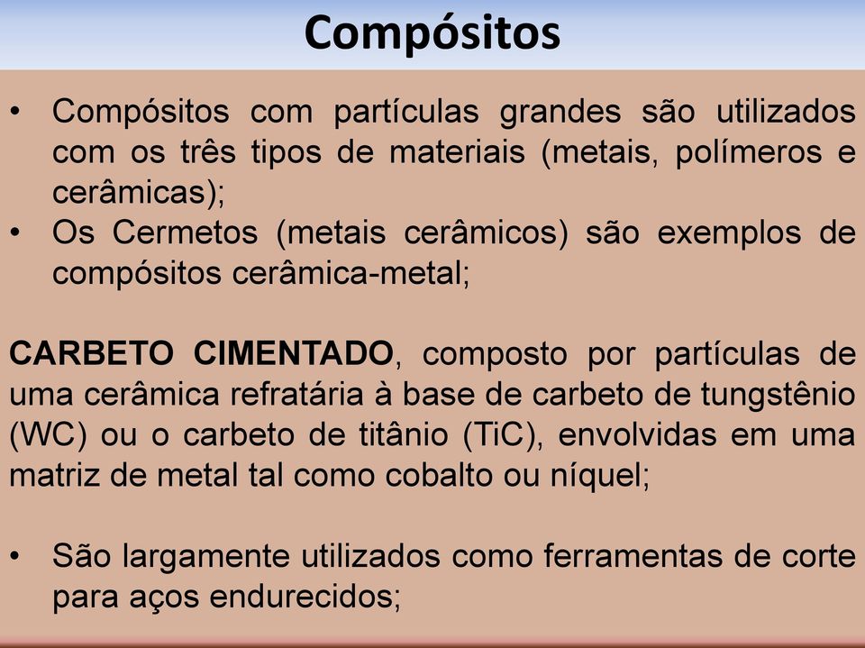 de uma cerâmica refratária à base de carbeto de tungstênio (WC) ou o carbeto de titânio (TiC), envolvidas em uma