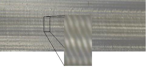Deslocamento (mm) Deslocamento (mm) 46 Figura IV.41: Textura superficial apresentada no ensaio 1 O teste 11 empregou a profundidade axial corte de 1 mm.