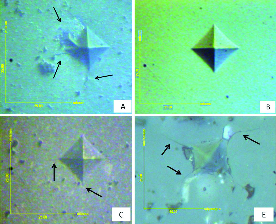 Figura 5. Imagens de microscopia óptica de impressões de dureza Vickers realizadas nas amostras (A) de alumina; (B) de zircônia; (C) de ZTA; (D) de SiC; (E) de alumina/mgo.
