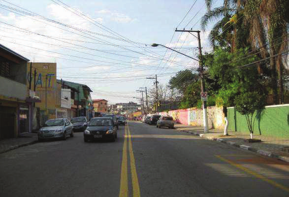 fls. 205 Foto: Vista parcial da Rua Justino Alves Batista, tomada de outro ângulo.