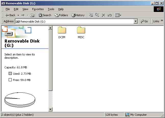 1 Clique duas vezes em [My Computer] t [Removable Disk] t [DCIM]. 1 2 Aparece o ecrã Completing the Scanner and Camera Wizard.