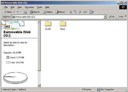 1 Clique duas vezes em [My Computer] t [Removable Disk] t [DCIM]. 1 2 Aparece o ecrã Completing the Scanner and Camera Wizard.