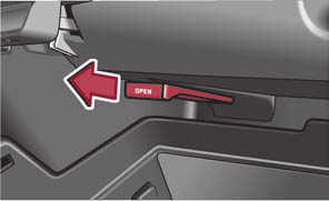 105 Painel de bordo: compartimento de arrumação do lado do passageiro dianteiro Abrir e fechar o compartimento de arrumação do lado do passageiro dianteiro Prima o botão fig.