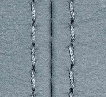 A COSTURA DE COURO EM MÁQUINAS DE DUAS AGULHAS Nas máquinas de duas agulhas são exe cutadas, numa só operação, duas costuras paralelas, que se encontram lado a lado.