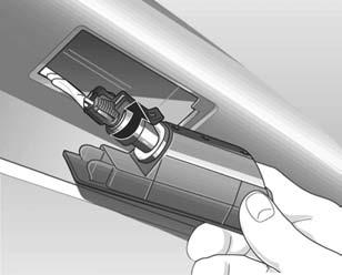 Remova o suporte da lâmpada com uma chave de fenda, fazendo pressão para o lado e