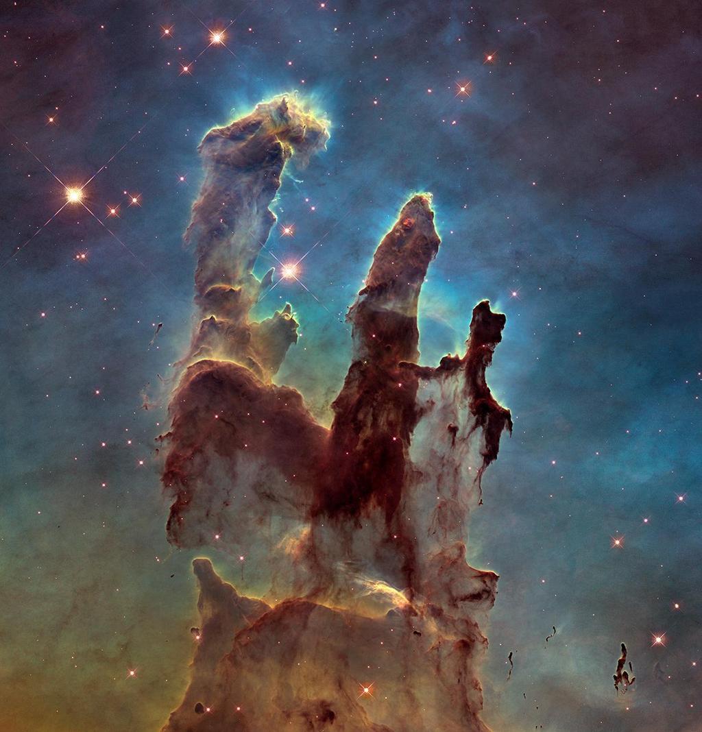 Nebulosa M16 - Pilares da Criação Os pilares, nuvens com cerca de 7 mil anos-luz de altura, é um exemplo de Nuvem Molecular Gigante.