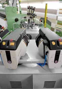 Sistema de Sucção FX-C, consistindo em: I Unidade de sucção sobre rodas para até 4 alimentadores de trama e até 8 bobinas I Unidade de sucção