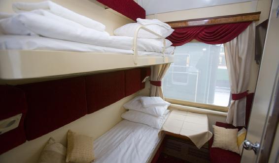 Acomoda de 1 a 2 passageiros por cabine. Cabine Business Class - São 6 cabines por vagão, com 2 camas em cada um.
