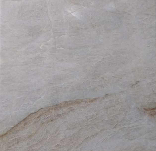 Figura 3.25 Aspecto macroscópico de ladrilho do quartzito "Perla Santana". Minerais essenciais: quartzo (94%)) e mica branca (6%); densidade: 2.