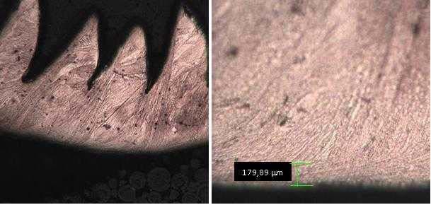 125 m/min e VB = 0,3 mm, utilizando aumentos de 100X e 400X, respectivamente Figura I.