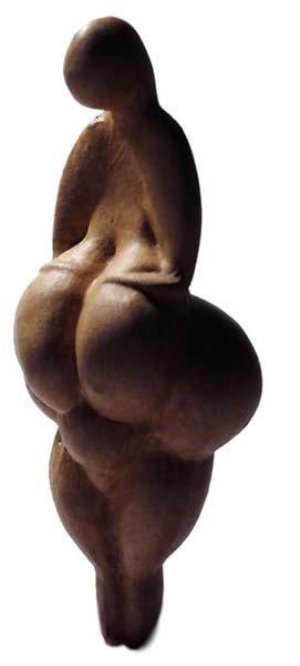 Vênus de Lespugue Esta estatueta é extremamente semelhante à Vênus de Willendorf. Têm ambas a mesma altura, datam sensivelmente da mesma época e representam, também, ideais de Beleza semelhantes.