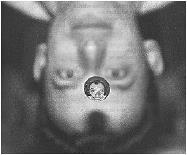 14. A figura representa a imagem de um astronauta plano de fundo que aparece em uma gota d água primeiro plano que está flutuando na Estação Espacial Internacional.