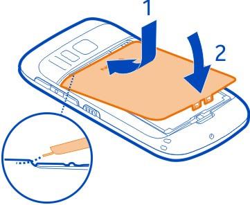 Remover o cartão SIM 1 Desligue o telefone. 2 Retire a tampa posterior.