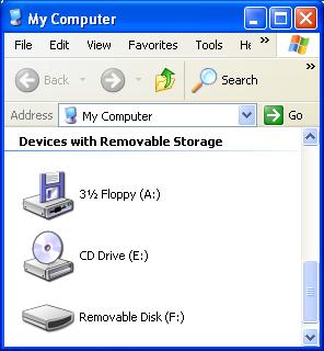4. Clique em O meu computador (My Windows XP Computer) no ambiente de trabalho. 5. Aparece uma unidade de disco removível. 6. Faça duplo clique sobre o disco removível.