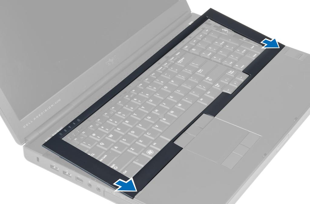 2. Pressione toda a borda do acabamento do teclado até que ela fique firme no lugar. 3. Instale a bateria. 4. Siga os procedimentos descritos em Após trabalhar na parte interna do computador.