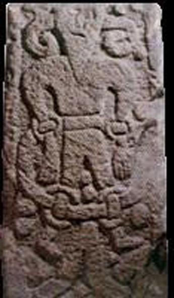 Figura 6: Loki stone, Fragmento cruciforme de Kirkby Stephen, Cumbria, Inglaterra, século XI. Imagem do sistema ragnarokiano. Fonte: http://students.ou.edu/a/shawn.k.akin-1/intro.