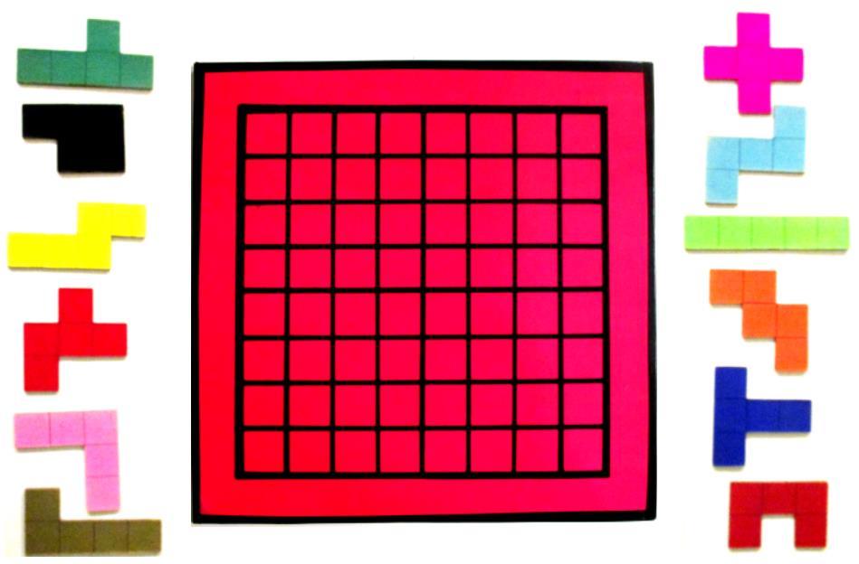 3. PENTAMINÓS PARTILHA PENTAMINÓS PARTILHA NÚMERO DE JOGADORES: 2 OBJETIVO: Colocar todas as peças no tabuleiro. MATERIAIS: 12 peças de cores diferentes e um tabuleiro quadrado, 8 x 8, com 64 casas.
