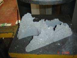 Região de Esfacelamento Região de Esfacelamento Figura 10: Modo de ruptura dos blocos de concreto.