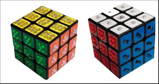 autoadesivos de cristais (strases relevo Crystale) nas cores das faces do cubo.