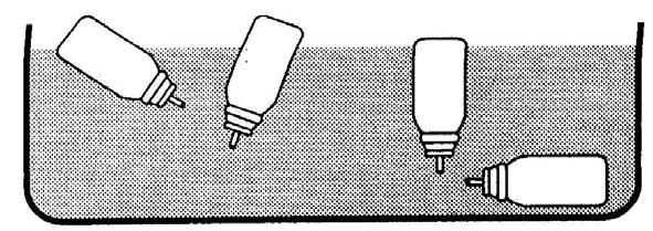 Remova o nebulizador da peça bucal plástica e coloque o Atrovent PA num recipiente com água. O conteúdo pode ser estimado através da observação da sua posição na água (ver fig. 2).