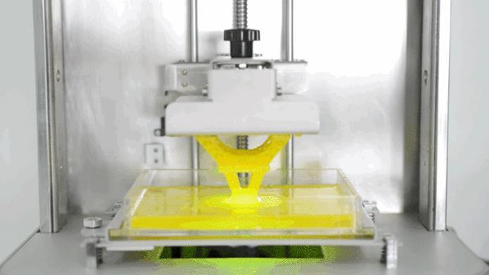 Tipos de Impressoras Estereolitografia Nela é utilizado um laser para solidificar partes de uma resina especial.