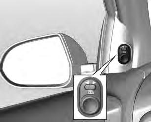 Black plate (13,1) Chaves, portas e vidros 2-13 Espelhos elétricos O controle para os espelhos elétricos se localiza no acabamento da porta do lado do motorista.