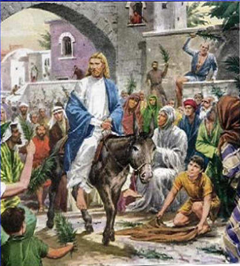 A entrada triunfal de Jesus O seu caminho está coberto por um tapete de folhas e de mantos, passa entre os aplausos e o sacudir de ramos festivos.
