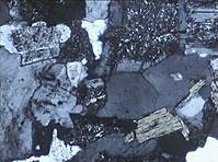 Rochas magmáticas ou ígneas Cristalinidade Proporção relativa de material cristalizado