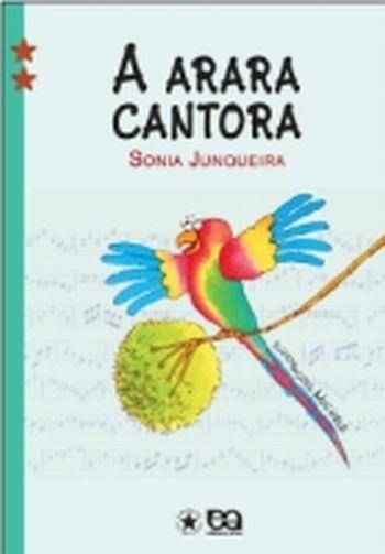1º Momento: Como sugestão contar a história : A arara Cantora de Sonia Junqueira, que retrata uma arara que adora cantar e canta de todo jeito, usando todos os timbres, usando mal a sua voz,