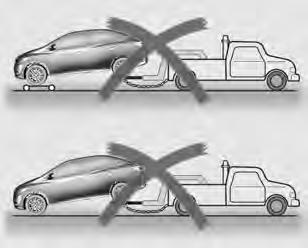 . Solte o freio de estacionamento do veículo rebocado e coloque a transmissão em neutro.