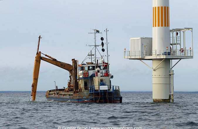 77/60 Ancoragem do cabo submarino no fundo do mar 