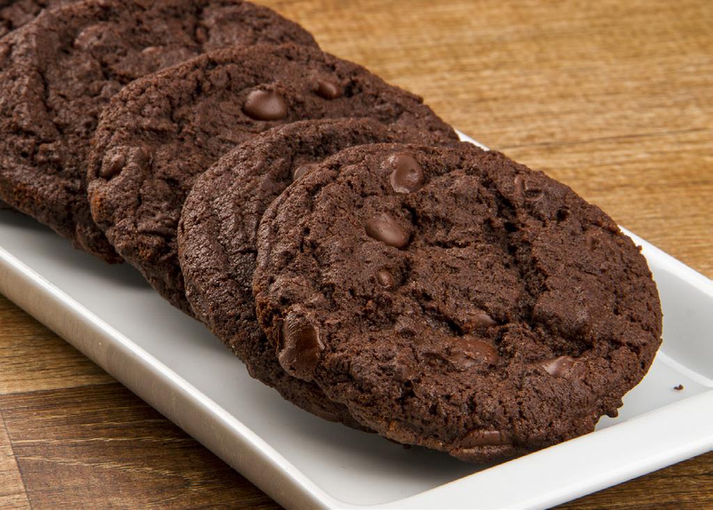 Confeitaria americana 8 100% chocolate chip cookies DURABILIDADE: aproximadamente 7 dias em temperatura ambiente (assado) / 60 dias no freezer sem assar 125 g de chocolate amargo 54,5% cacau 150 g de